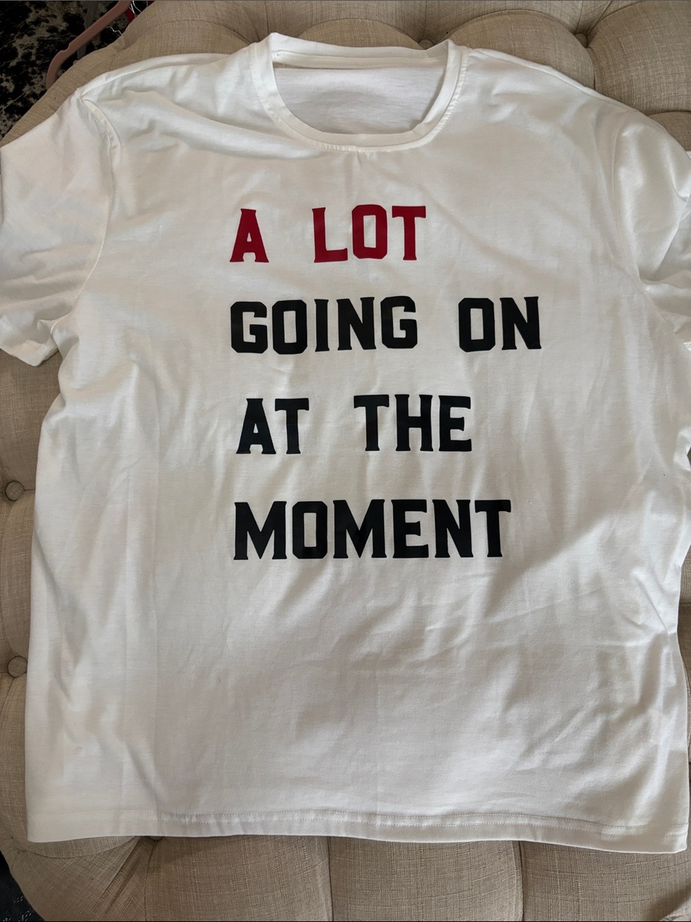 White Graphic Short Sleeve Tee with 'A Lot Going On At The Moment' Text